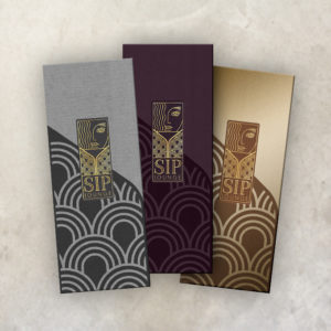 Three art deco style menu covers printed foil stamped