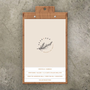 wood menu board holds staggered inserts screwposts