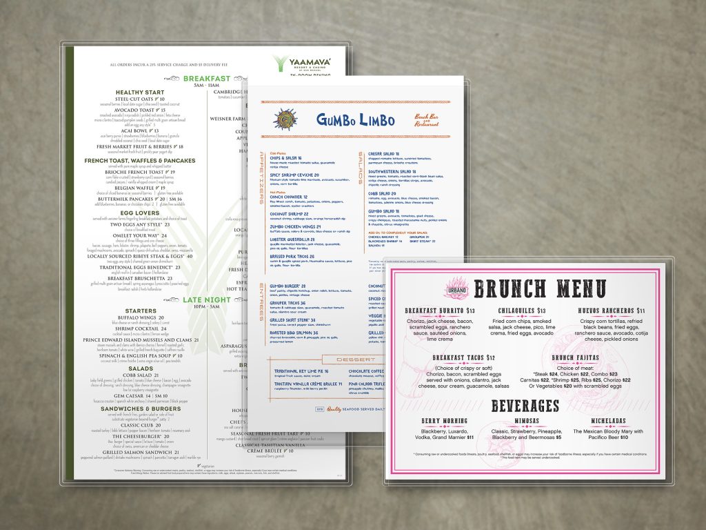 Three different sizes of printed menus in waterproof clear plastic sleeves