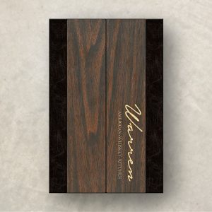 Dark wood gatefold menu with engraved logo